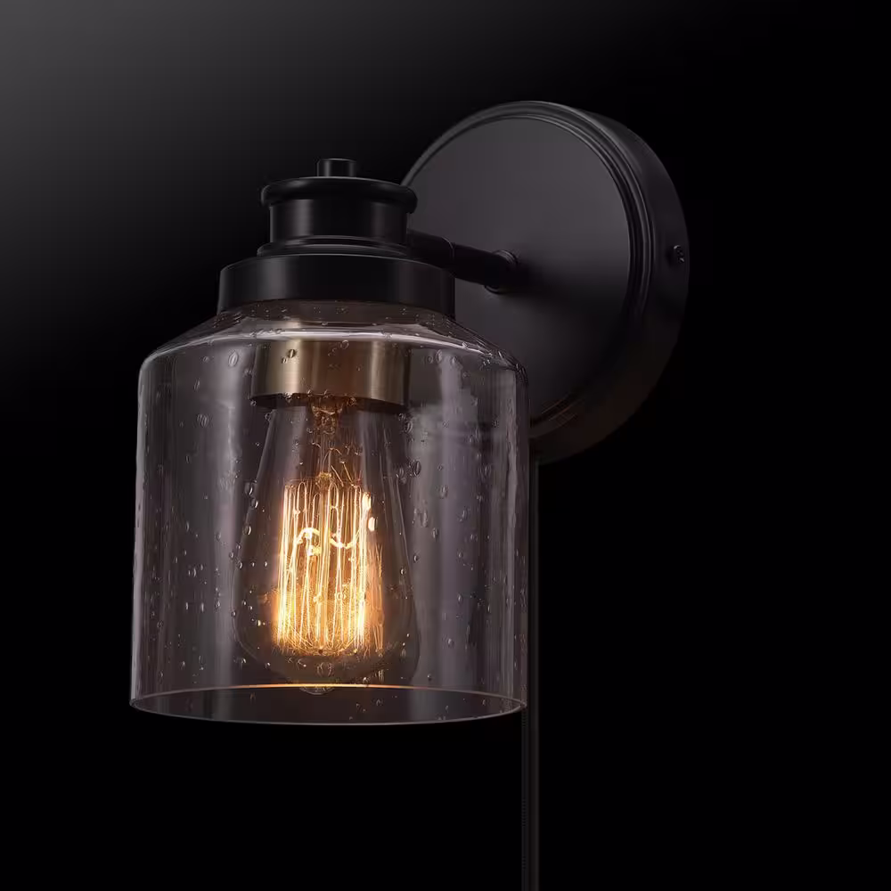 Globe Electric 1-Light Matte Black Plug-In or Hardwire Wall Sconce with Seeded Glass Shade, In-Line On/Off Rocker Switch, 6 ft. Cord